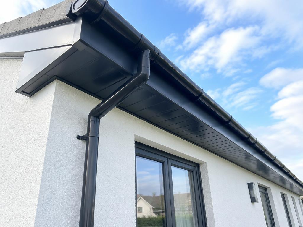 New black uPVC fascias, soffits and guttering on a bungalow in Aberdeenshire